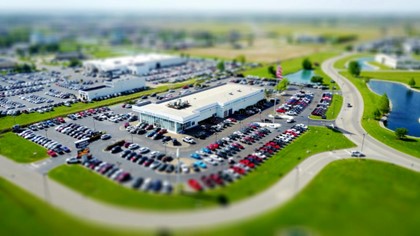 overhead view of car dealership with soft focus around edges
