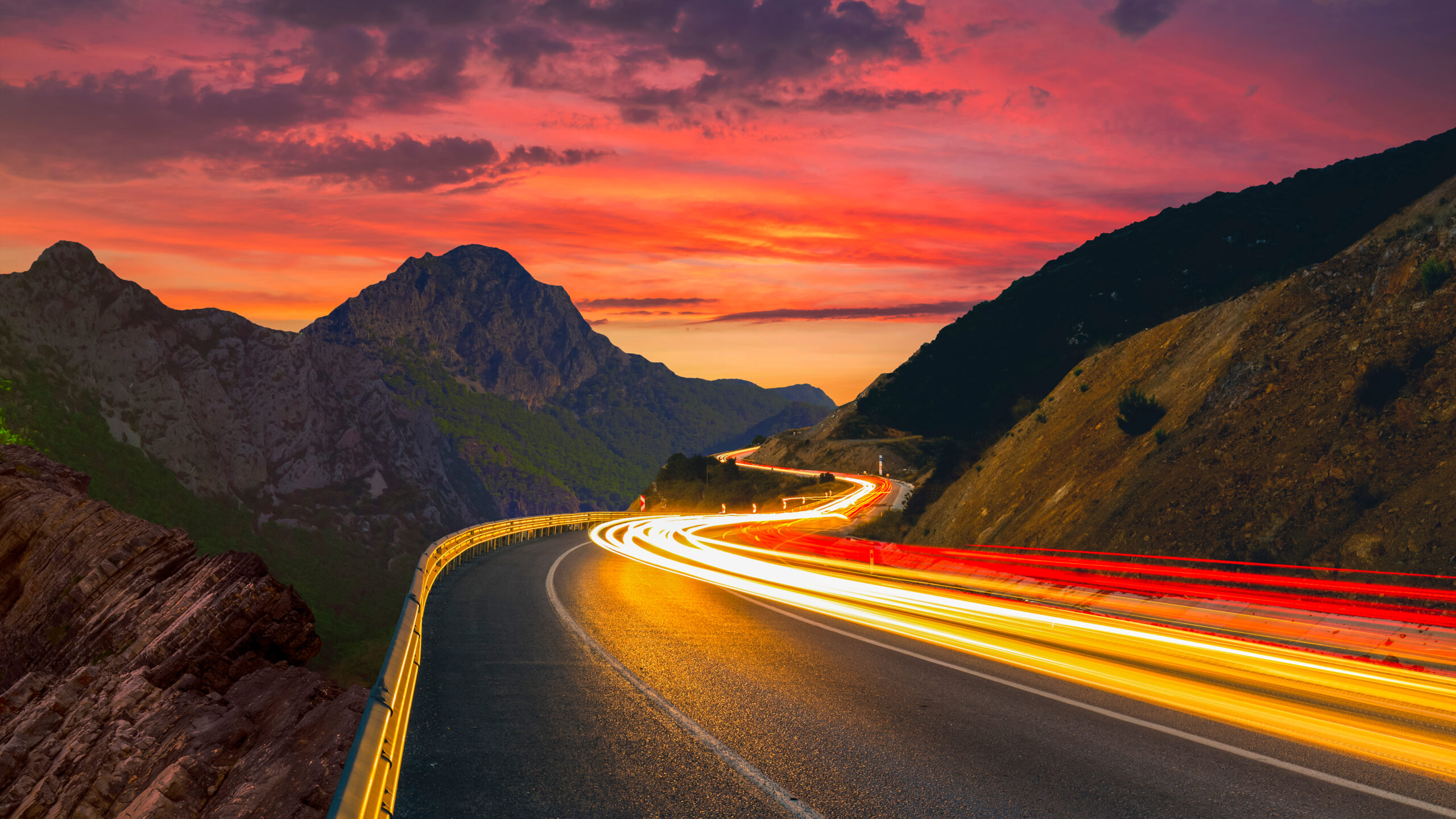 vehicles driving long exposure sunset